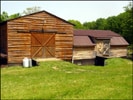 A rear shot of our Breeding Barn and a partial shot of the foaling paddock.